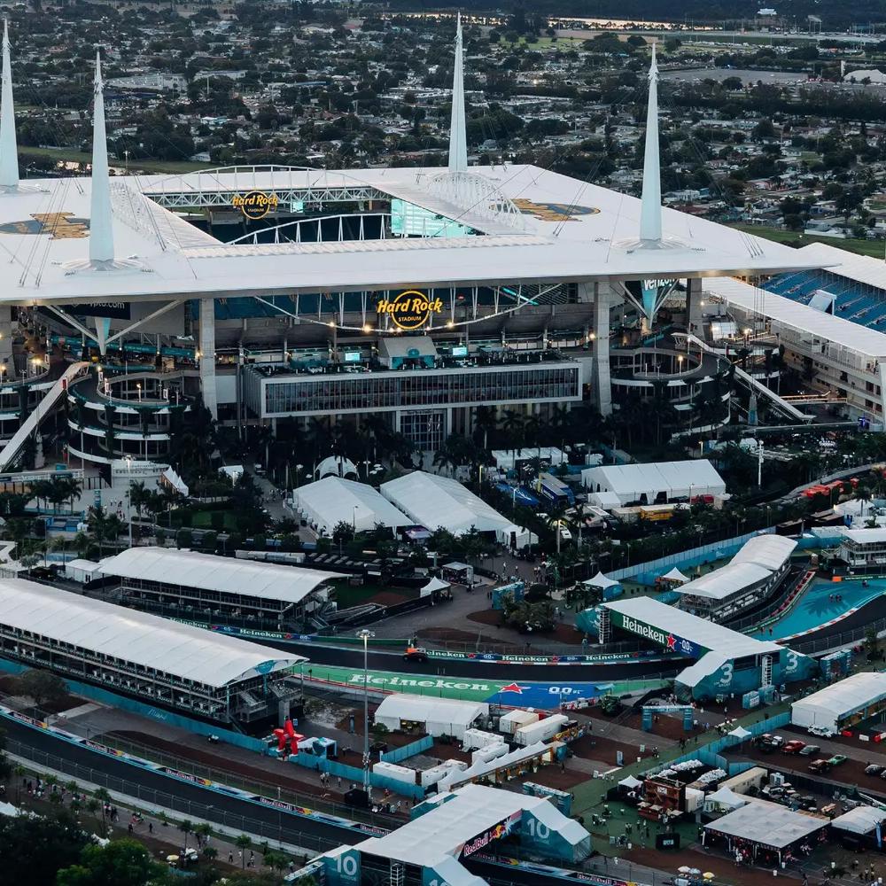 Aerial view of the Hard Rock Cafe Stadium at dawn.