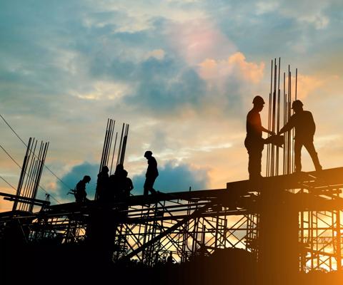 Silhouette of engineer and construction team working at site over blurred background sunset pastel for industry background with Light fair.Create from multiple reference images together.