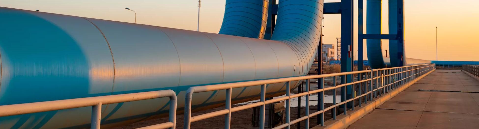 Blue pipes going to oil refinery