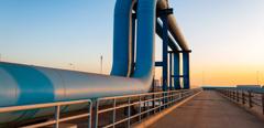Blue pipes going to oil refinery
