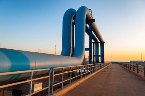 Blue pipes going to oil refinery