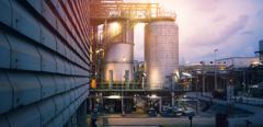 Chemical tanks in petrochemical industry plant or Reactor for chemical reaction in factory with blue sky sunset background