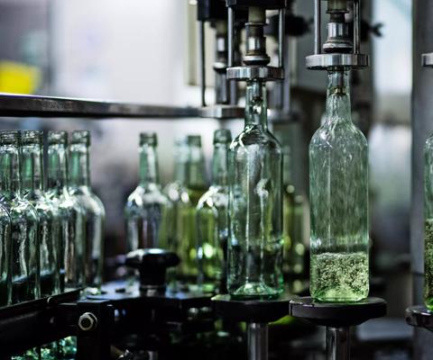 Wine bottles in bottling plant at factory