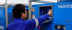 Aggreko technician working on temperature control equipment, China