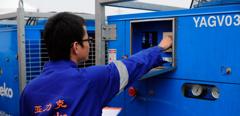 Aggreko technician working on temperature control equipment, China