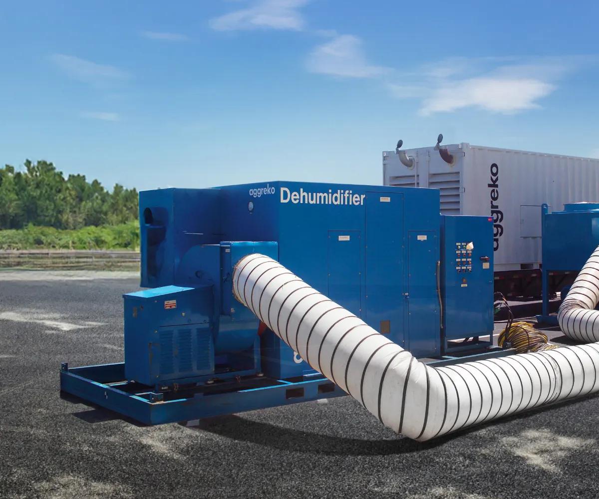 Aggreko moisture control unit operating on the exterior of a facility.