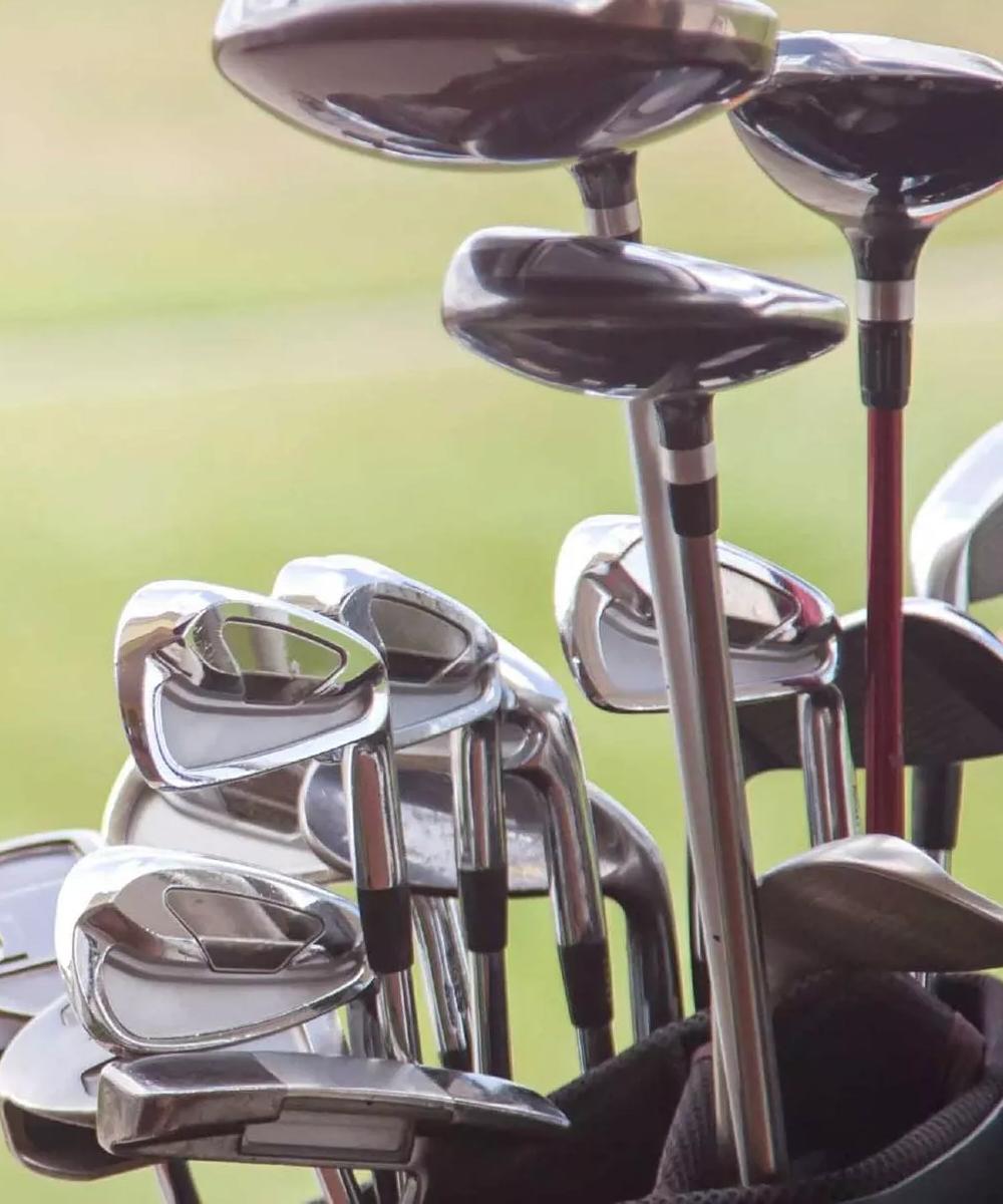 Close-up of golf irons.