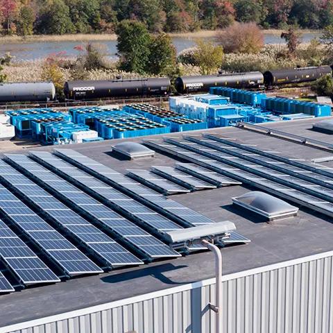 Aerial view of a distribution center with several, Aggreko products on the back.
