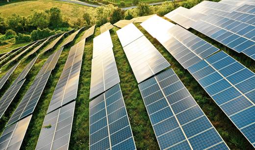 Solar panels fields on the green hills