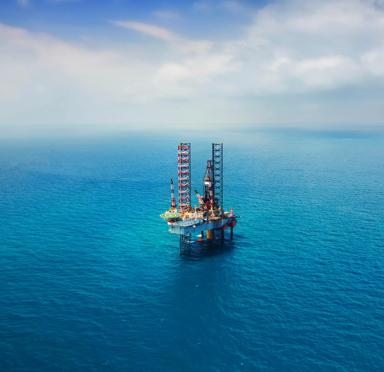 Offshore oil rig in the gulf view from aerial