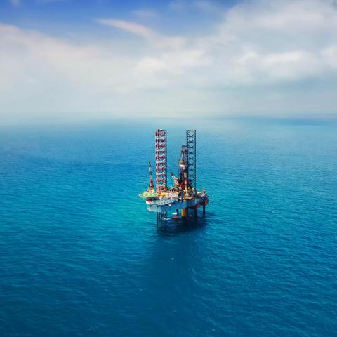 Offshore oil rig in the gulf view from aerial