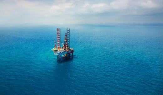 Offshore oil rig in the gulf view from aerial