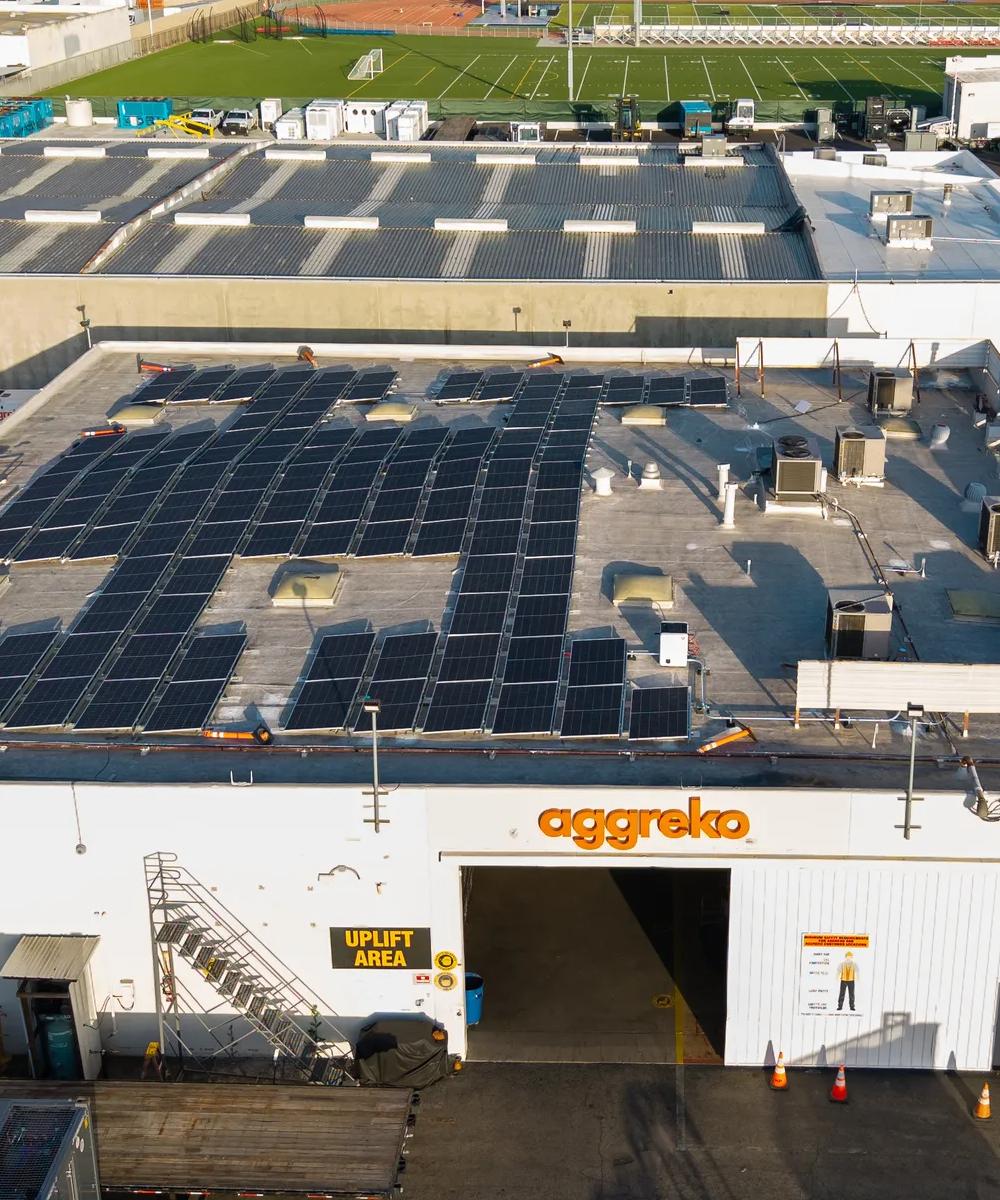 Aerial view of the Los Angeles service center with lots of solar panels on the roof.