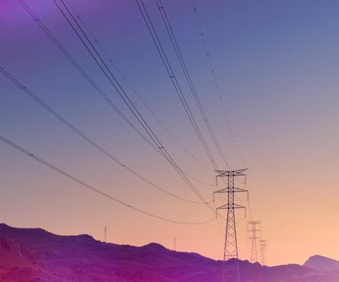 Electricity pylons at sunset