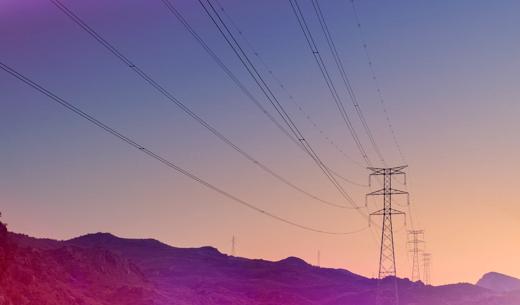 Electricity pylons at sunset