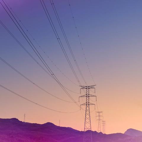 Electricity pylons at sunset