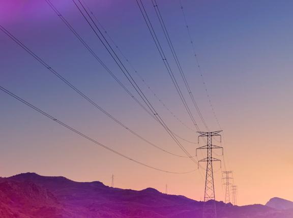 Electricity pylons at sunset