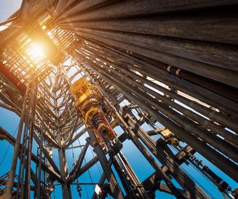 Oil drilling rig operation on the oil platform in oil and gas industry. Industrial concept.